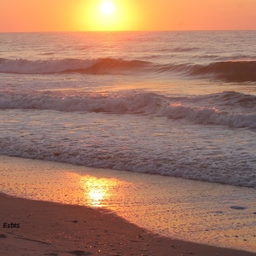 A golden sunrise at Wrightsville Beach.