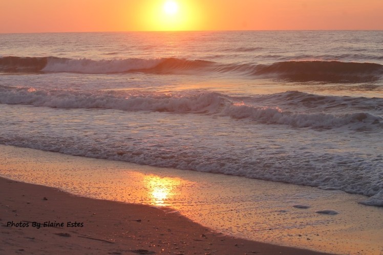 A golden sunrise at Wrightsville Beach.
