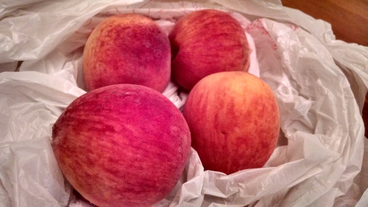 Four unpeeled SC peaches.